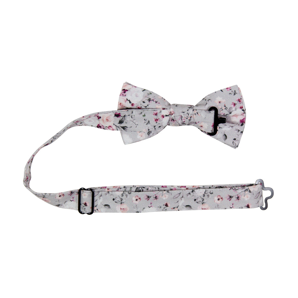Sweet Pea Pre-Tied Bow Tie with adjustable neck strap. Light gray background with groups of white, blush and burgundy flowers and black and gray stems and leaves.