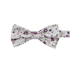 Sweetly Picked Pre-Tied Bow Tie. White background with light and dark purple small flowers, brown vines.