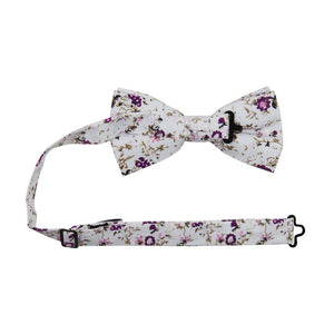 Sweetly Picked Pre-Tied Bow Tie with adjustable neck strap. White background with light and dark purple small flowers, brown vines.
