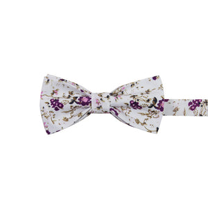 Sweetly Picked Pre-Tied Bow Tie. White background with light and dark purple small flowers, brown vines.
