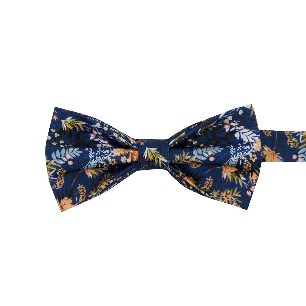 Tiger Lily Pre-Tied Bow Tie. Dark navy blue background with peach flowers and dusty blue, yellow, green and black leaves.