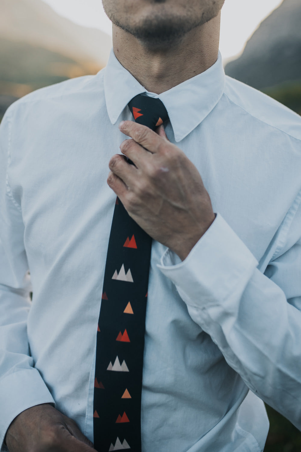 Utah tie worn with a white shirt.
