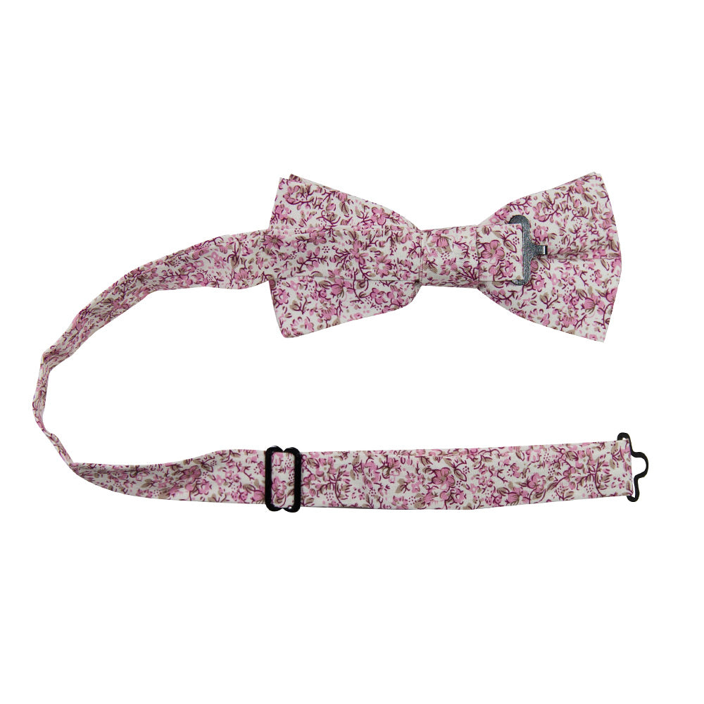 Ventura Pre-Tied Bow Tie with adjustable neck strap. Off-white background with small blush pink and light brown flowers and leaves.
