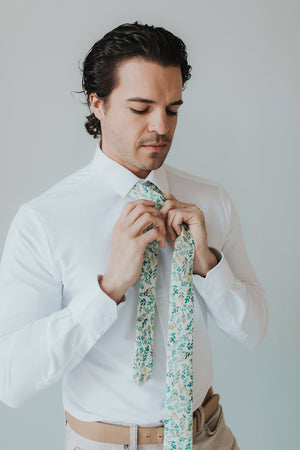 Vineyard Tie worn with a white shirt, brown belt and light tan pants.