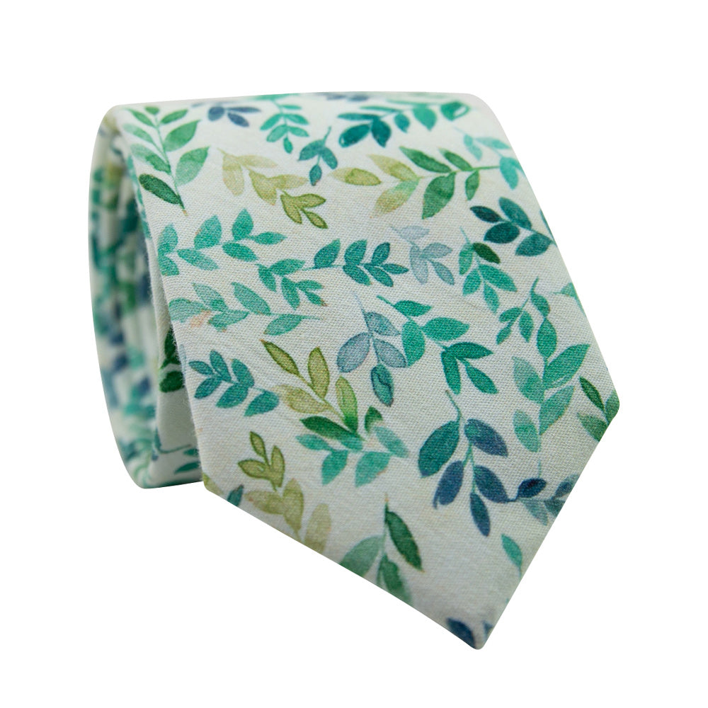 Vineyard Skinny Tie. Off white background with different shades of small green leaves. 