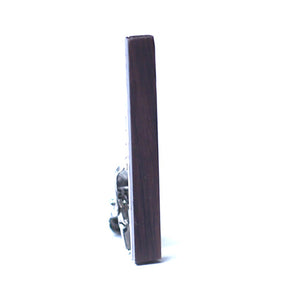 Dark Brown wood tie bar with the metal clip showing on the back. 