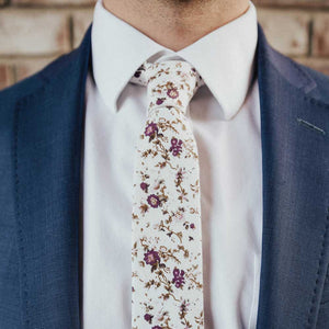 Sweetly Picked tie worn with a white shirt and navy suit jacket.
